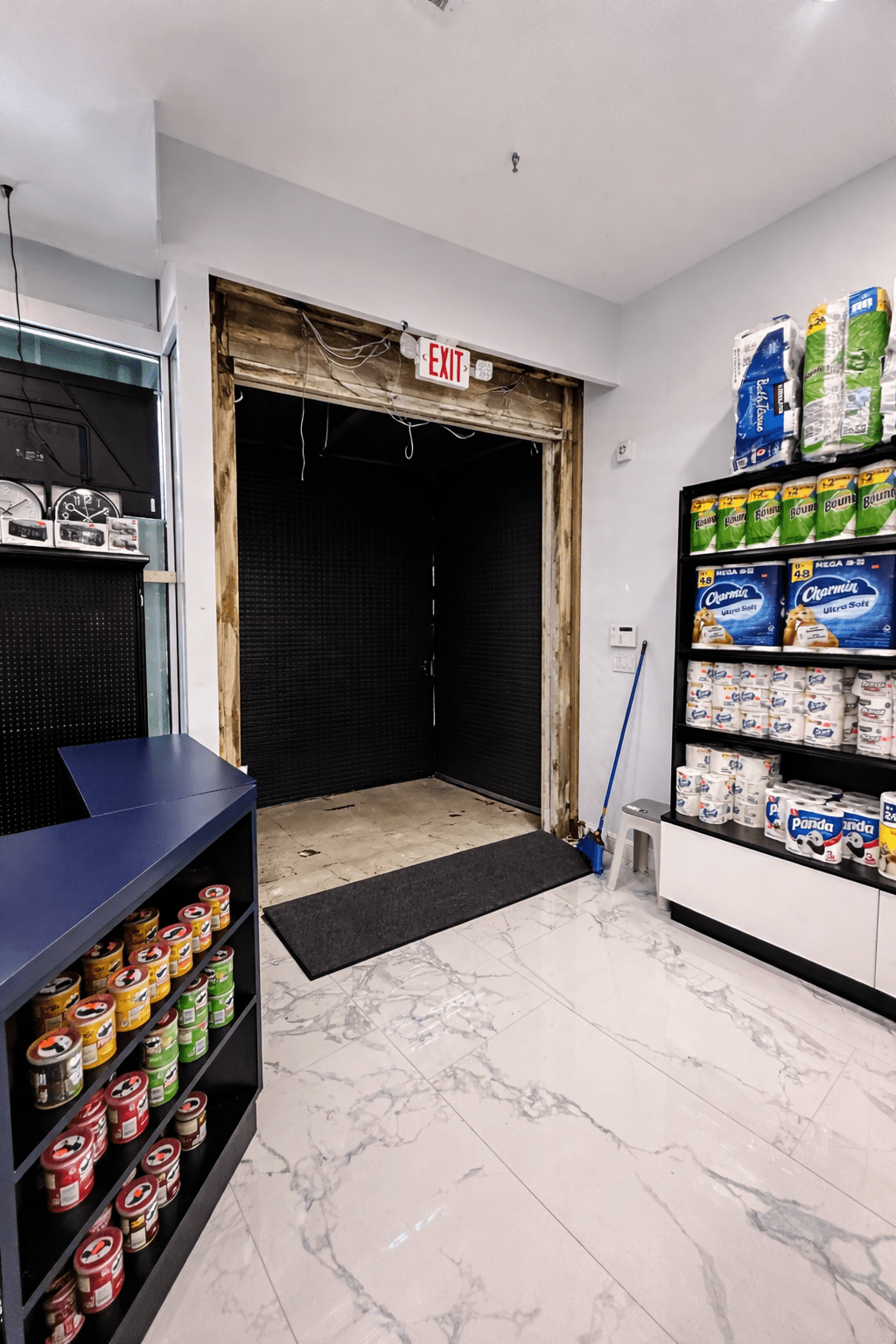 Store entrance with open shutter